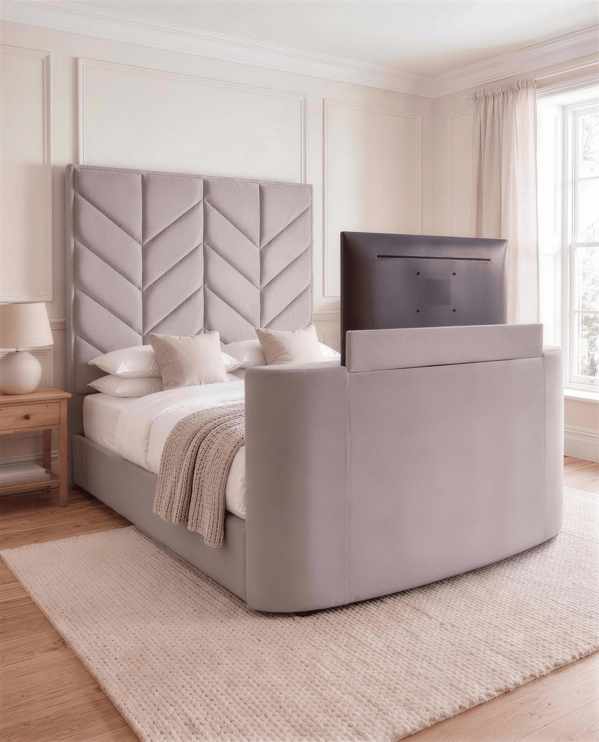 Chevron TV Bed with TV raised – Custom Luxury Bed | Custom Bed Co