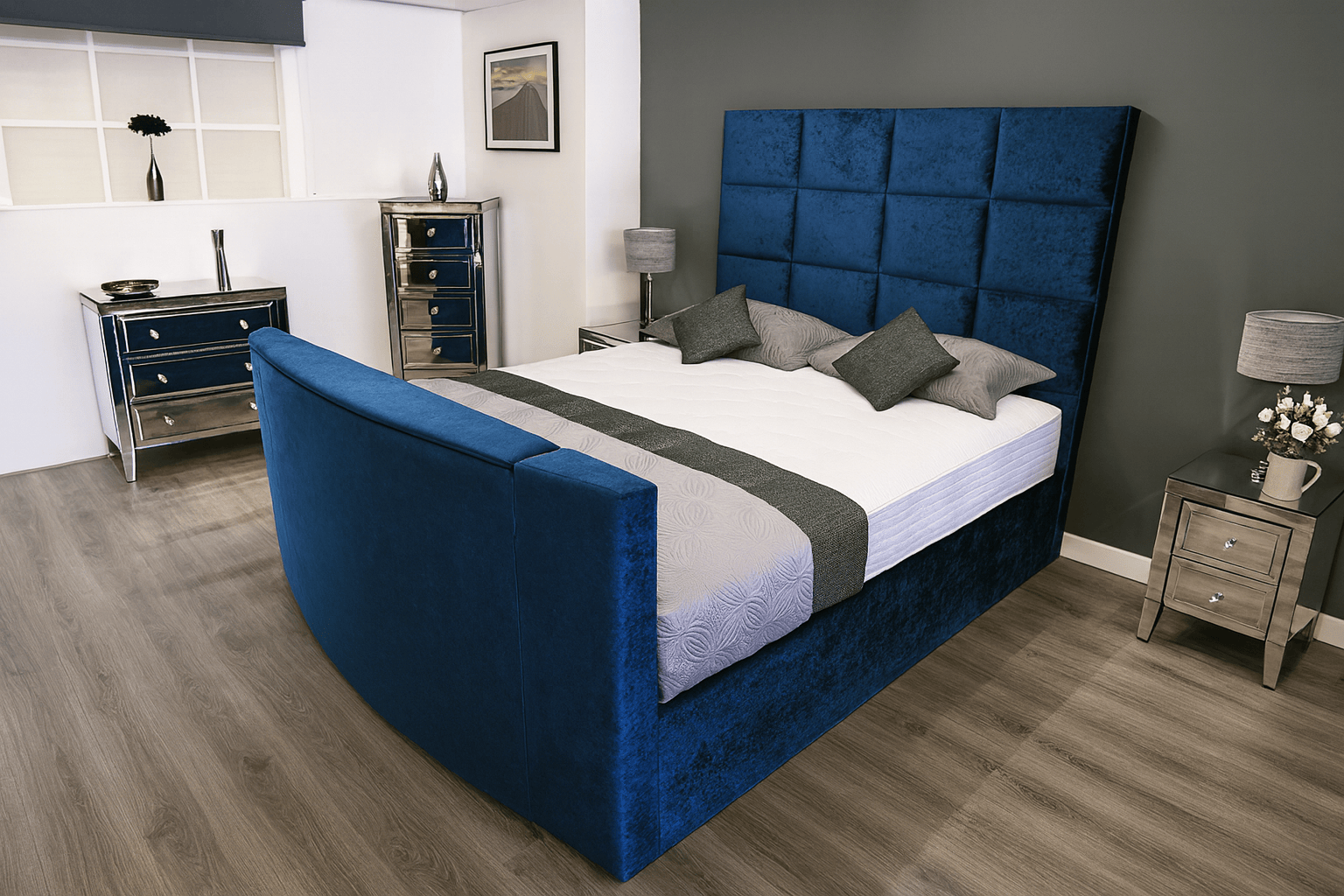 Modern bedroom with a blue upholstered bed and matching headboard. – Custom Luxury Bed | Custom Bed Co